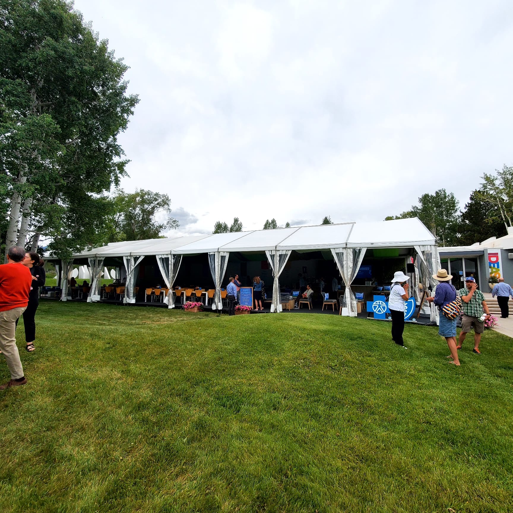 guests under party tent