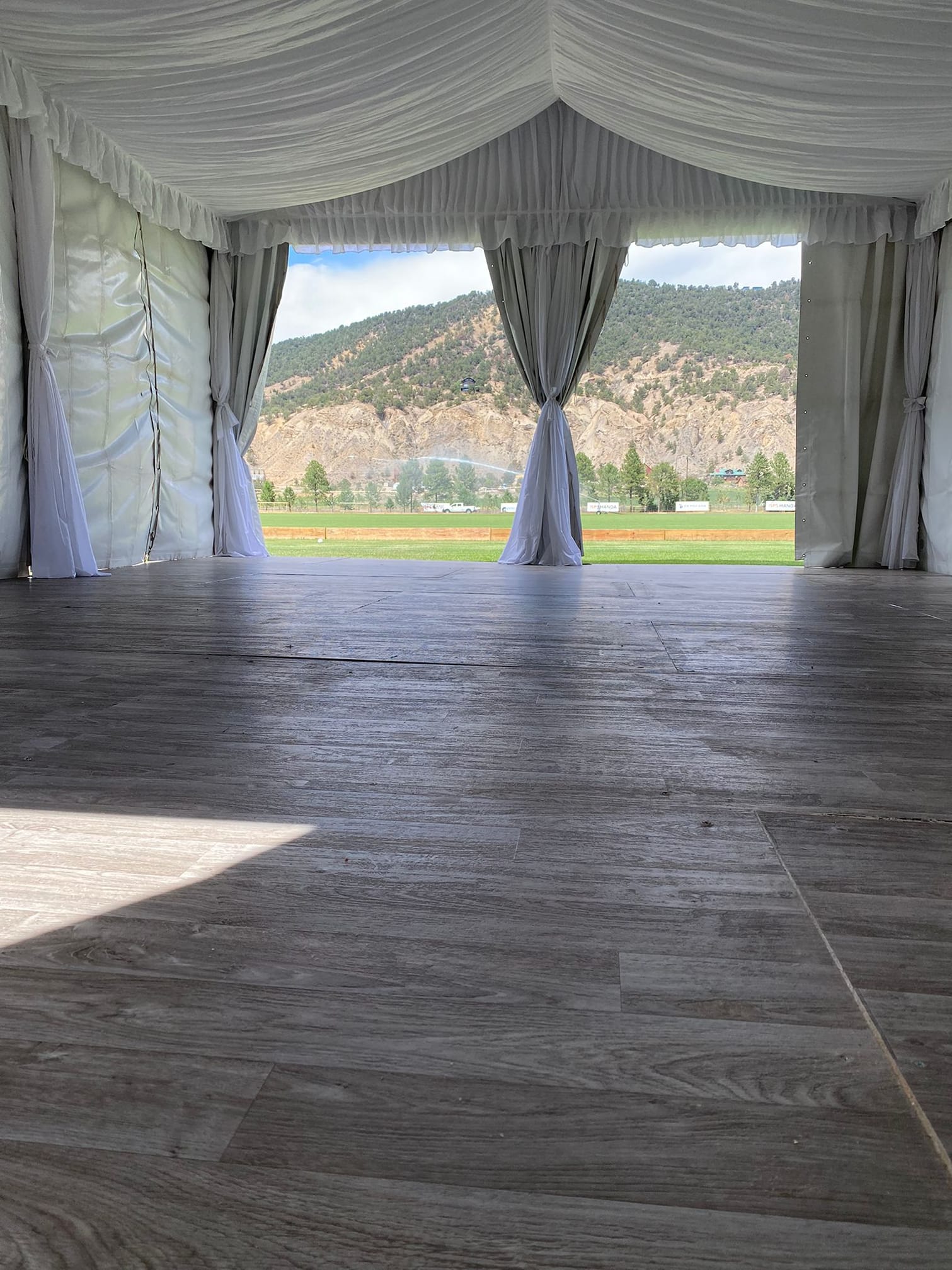 tent rental with wood flooring