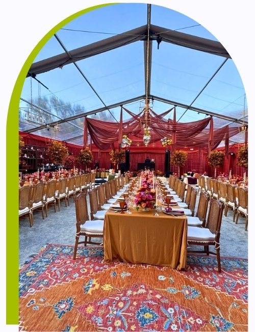 red and orange themed wedding reception